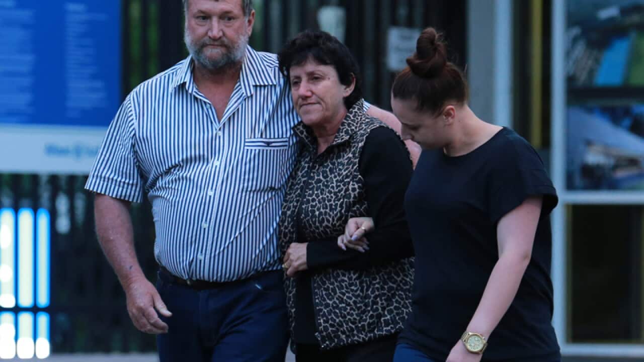 Parents Greg and Virginia Hughes and sister Megan