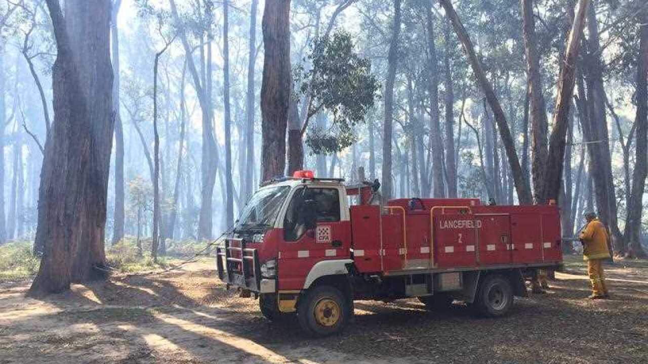 Firefighters battle the Lancefield bushfire in Victoria.