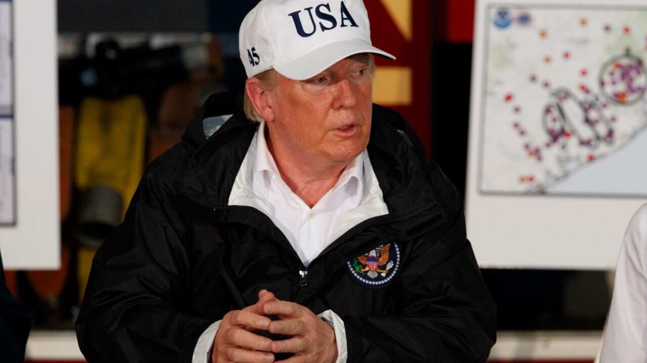 President Donald Trump participates in a briefing on Harvey relief efforts, Tuesday, Aug. 29, 2017, in Corpus Christi, Texas.