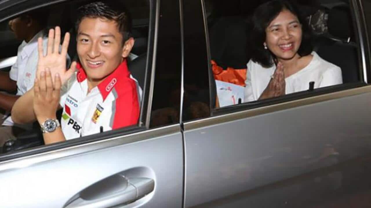 Rio with his mother, Indah Pennywati Haryanto