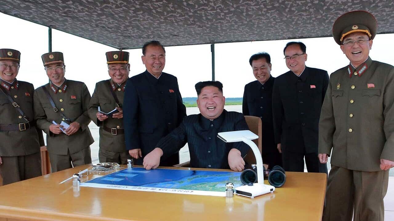 North Korean leader Kim Jong Un, smiles as Kim inspects the test launch of a Hwasong-12 intermediate range missile in Pyongyang, North Korea on 29 Aug 2017.