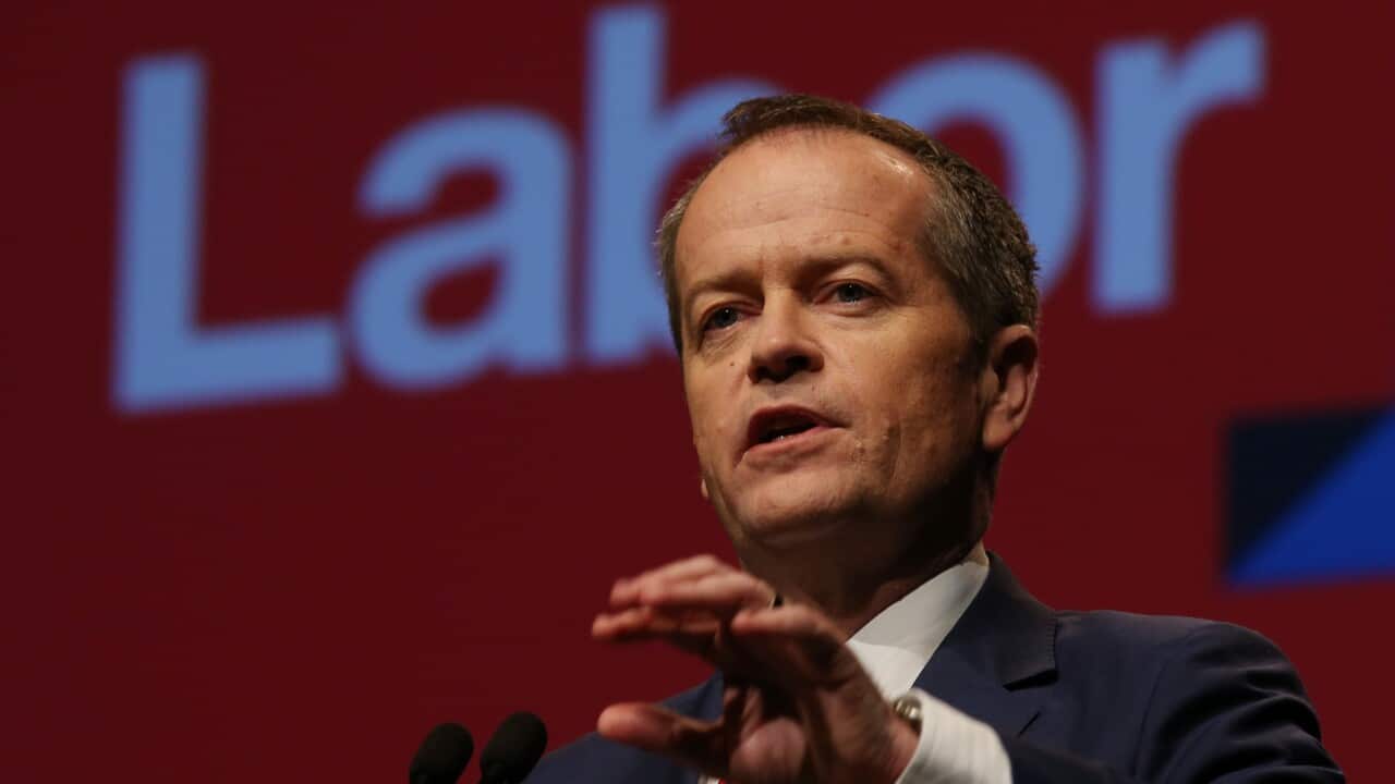 Federal Labor leader Bill Shorten addresses delegates during the final day the 2015 ALP National Conference at the Melbourne Convention Centre in Melbourne
