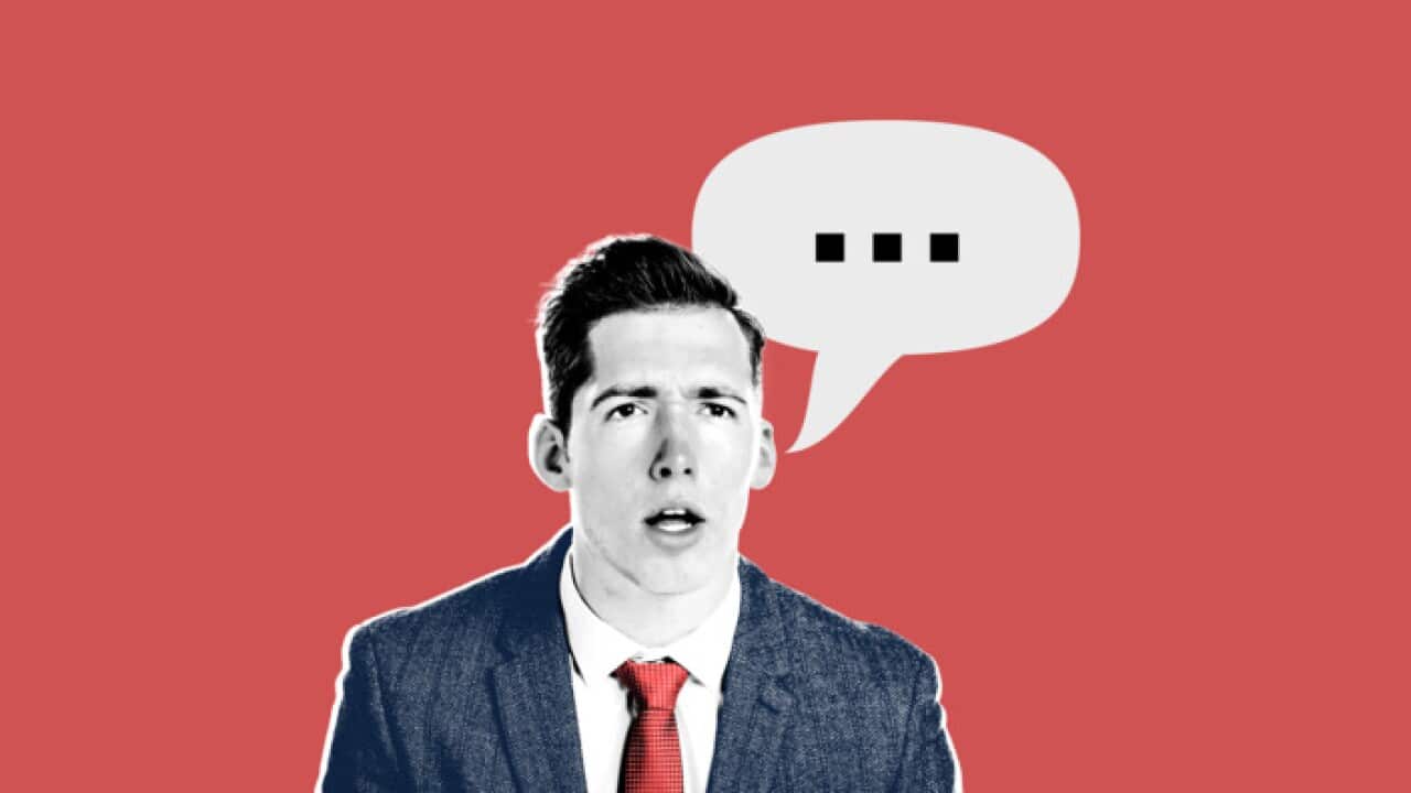 Close-up of a confused young businessman on white background. (kickimages)