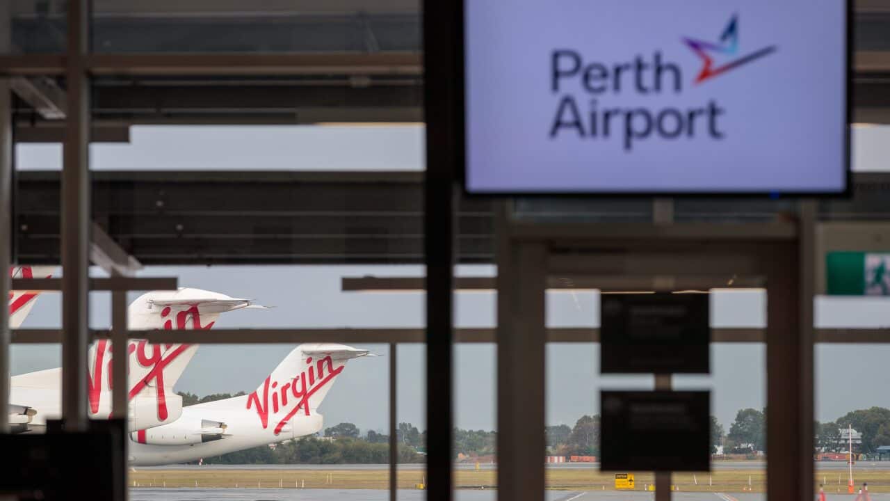 A general view of Virgin Australia aircraft at T2 Perth Domestic Airport terminal in Perth, Saturday, April 25, 2020. (AAP Image/Richard Wainwright) NO ARCHIVING