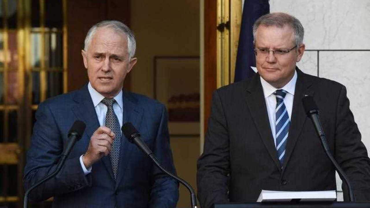 Australian Prime Minister Malcolm Turnbull and Federal Treasurer Scott Morrison speak at a press conference at Parliament House in Canberra.