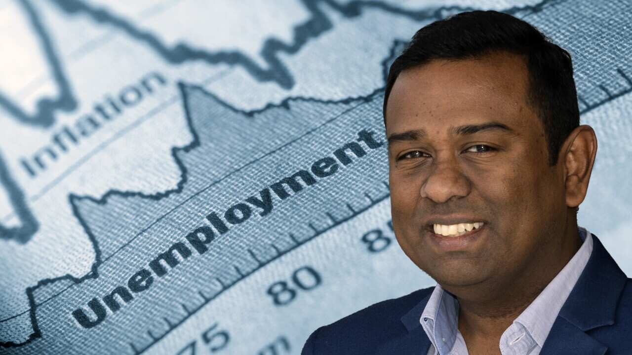 Folded sheet of paper with an unemployment graph on; Gokul Chandrasekaran