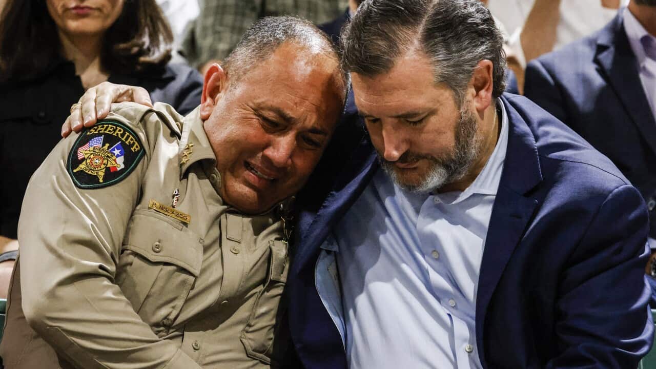 Uvalde County Sheriff Ruben Nolasco (L) cries, as he is comforted by US Senator Ted Cruz Texas, USA, 25 May 2022.