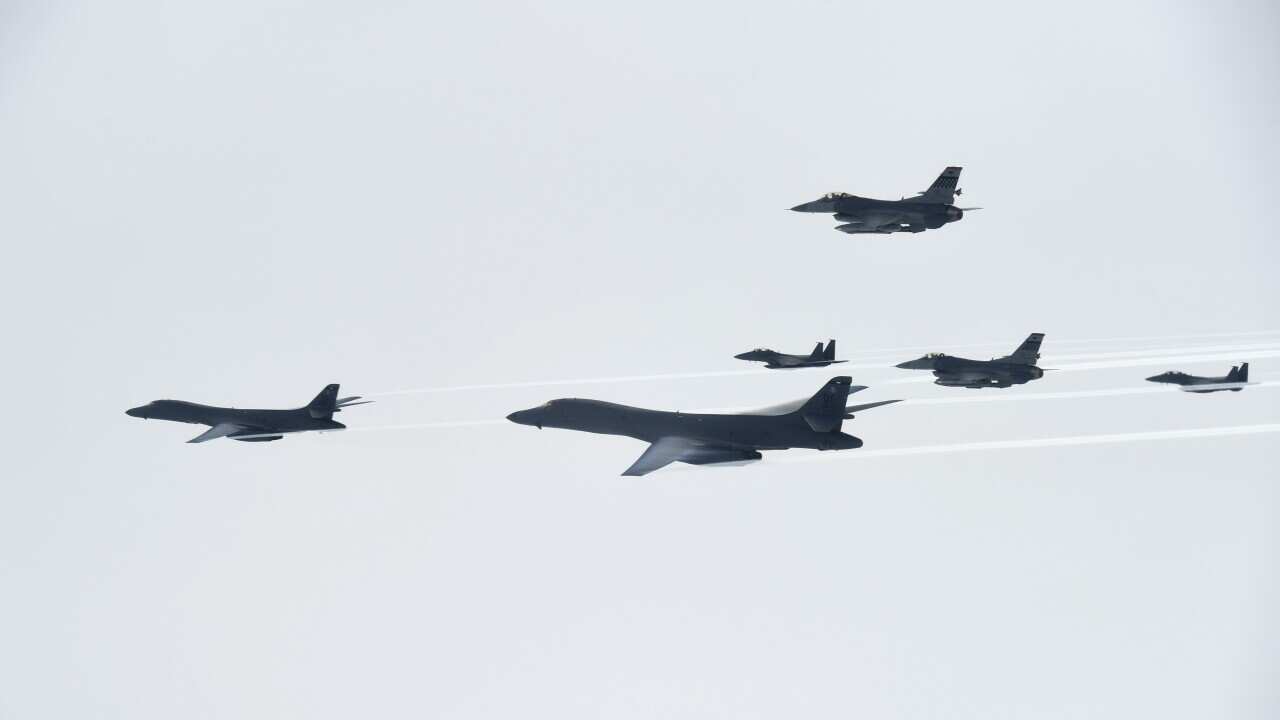U.S. Air Force B-1B bombers, left and second from left, fly with South Korean and U.S. fighter jets over the Korean Peninsula, South Korea