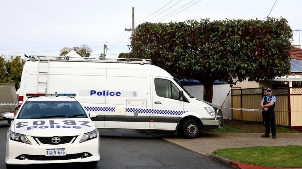 Police are seen outside a property in Coode Street, Bedford, Perth.