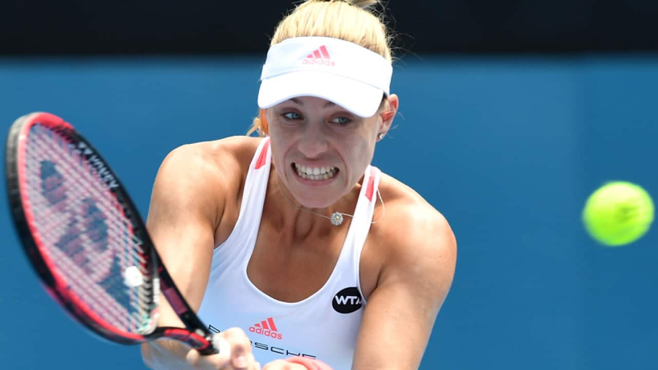 Angelique Kerber of Germany returns a shot to Daria Kasatkina