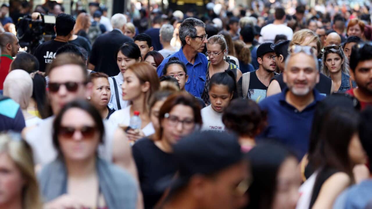 Shoppers looking for a bargain at the Boxing Day sales in Pitt St Mall Sydney, Saturday, Dec 26, 2015. Shopping crowds are down this year in the city due to suburban Westfields opening for the first time. (AAP Image/Jane Dempster) NO ARCHIVING