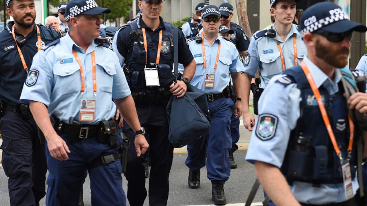 Police arrive at the G20 convention centre.