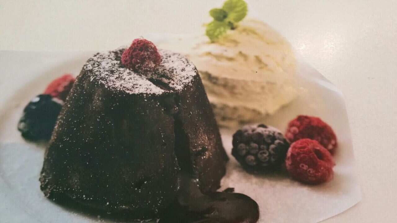 Chocolate cake with vanilla ice cream