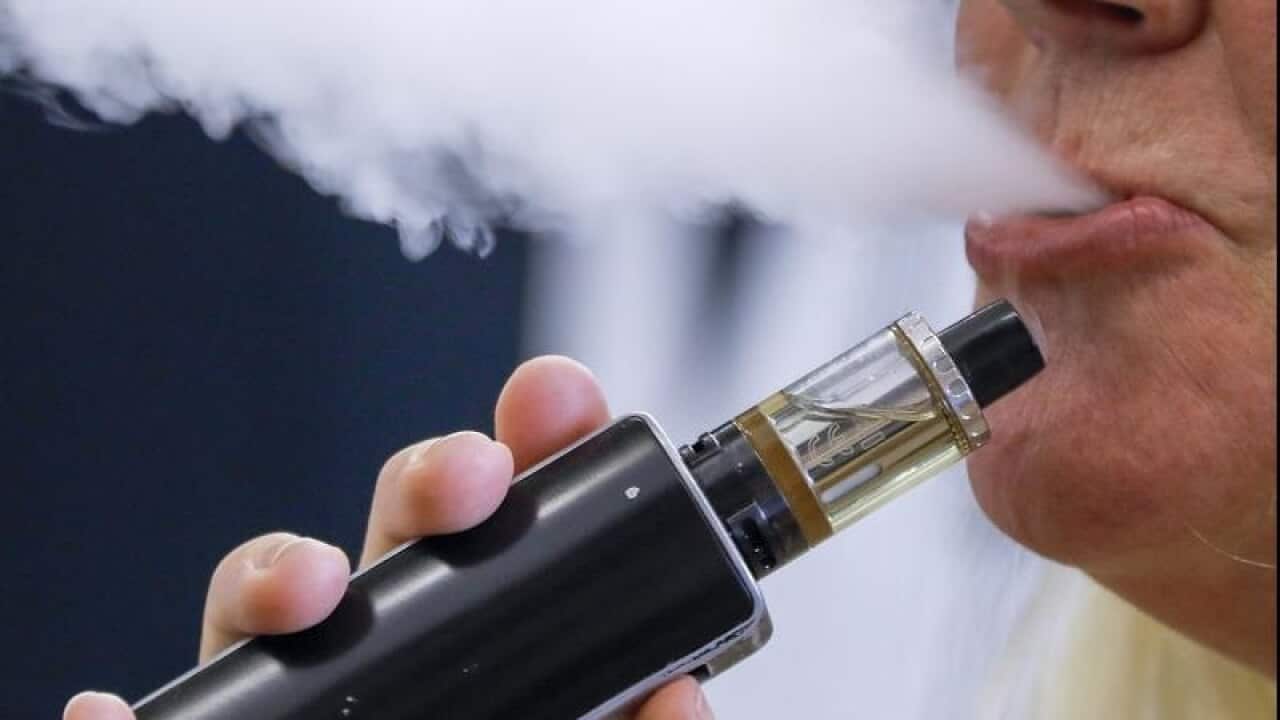 A file image of a person vaping