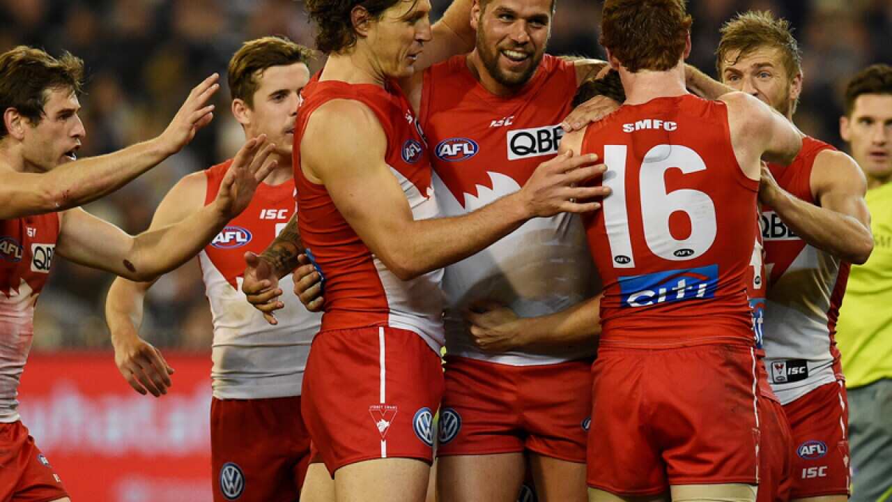 the Swans celebrate