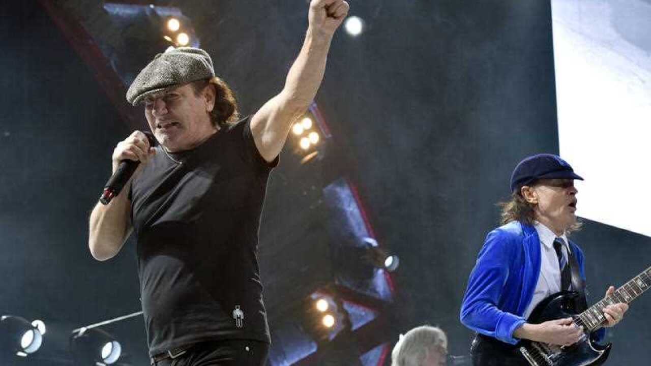 Brian Johnson and Angus Young perform with AC/DC