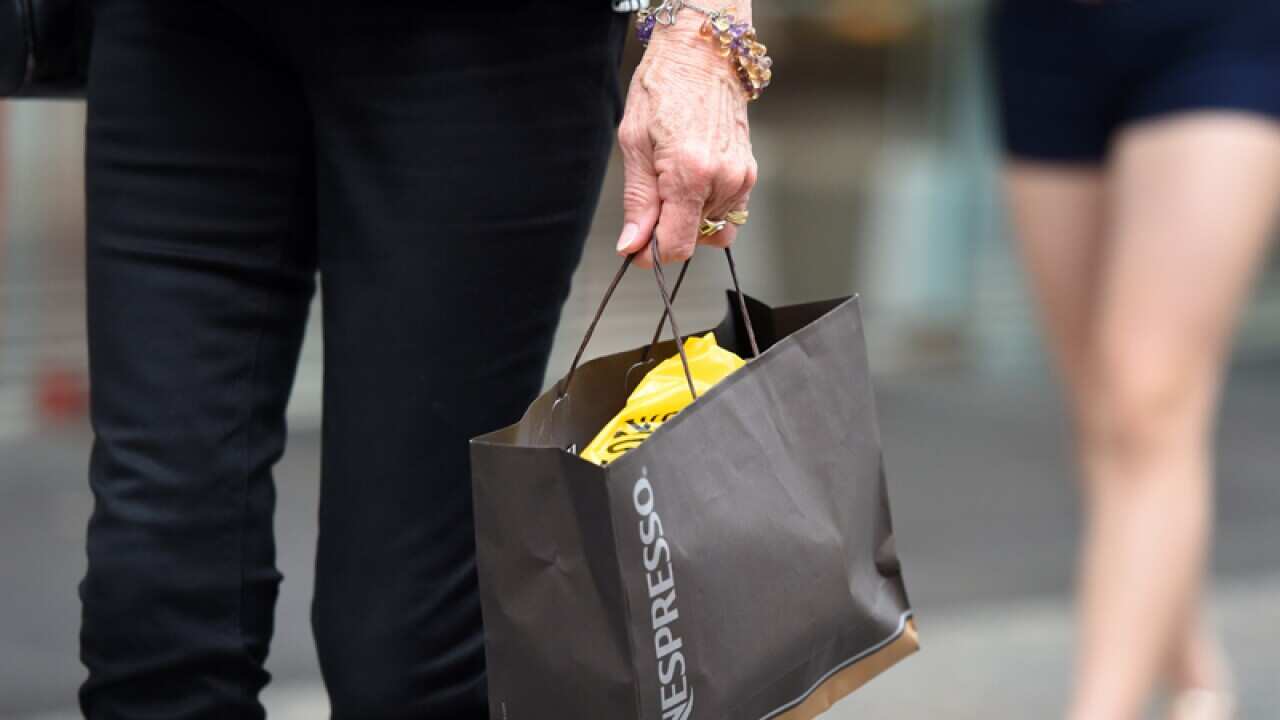 Shoppers walk through Queen Street mall.