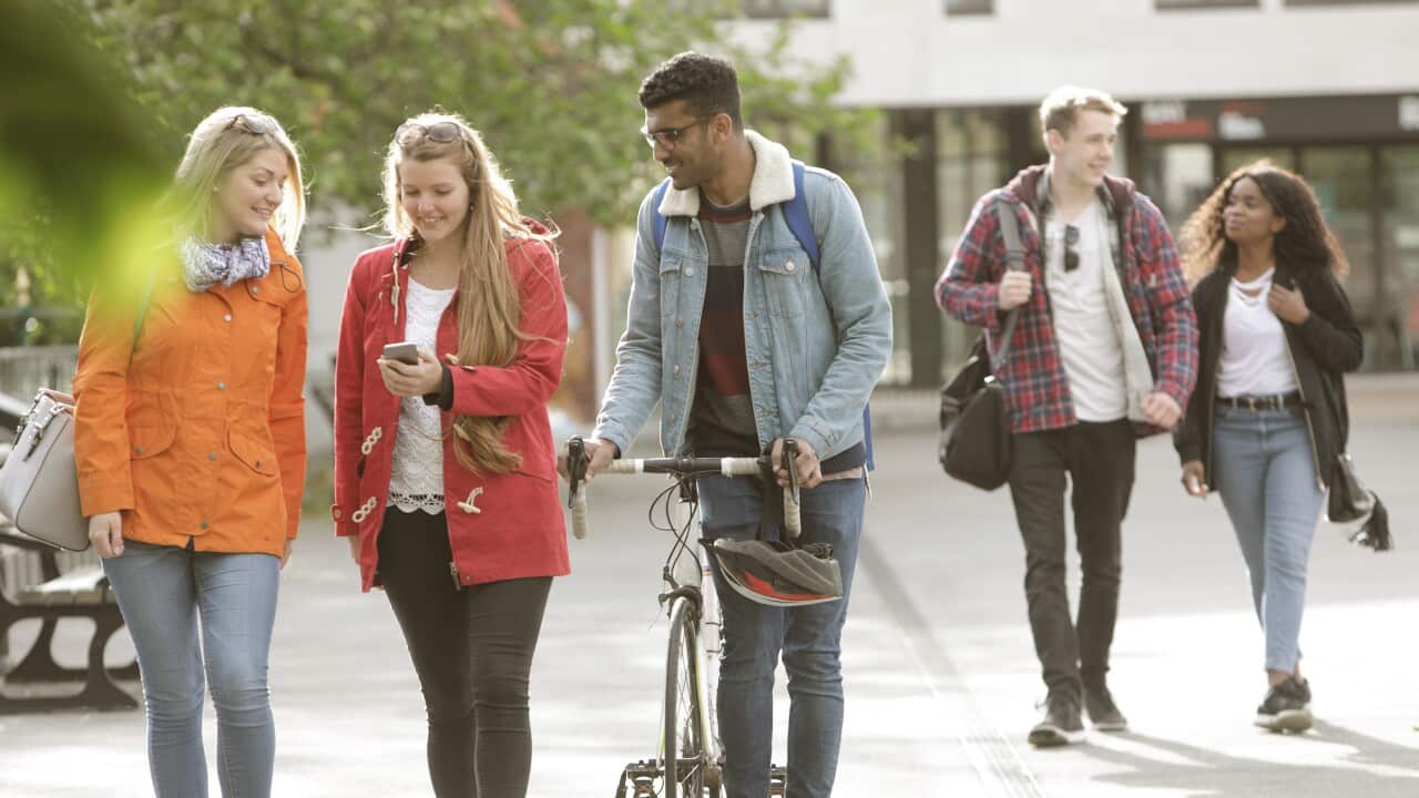 Students walking outside university