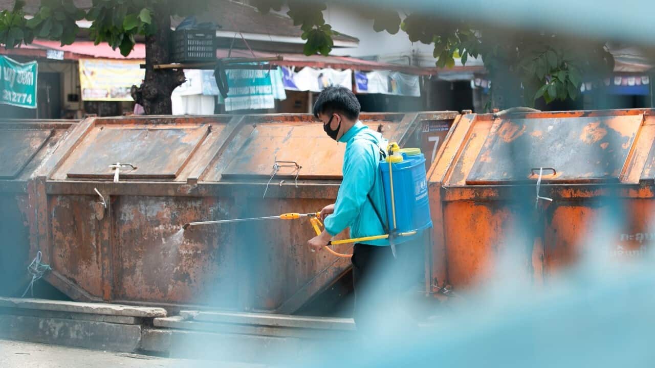 A man disinfects a closed market in Luang Prabang, Laos, April 27, 2021. Luang Prabang imposed a lockdown (Xinhua - Kaikeo Saiyasane via Getty Images)
