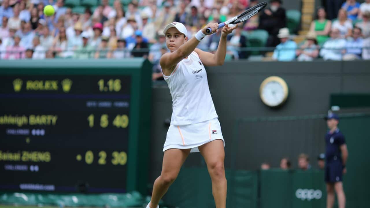 Ashleigh Barty with a backhand against Saisai Zheng at Wimbledon