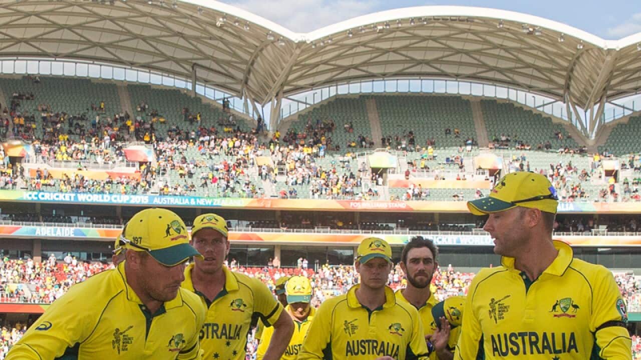 Michael Clarke of Australia leads his team off the field