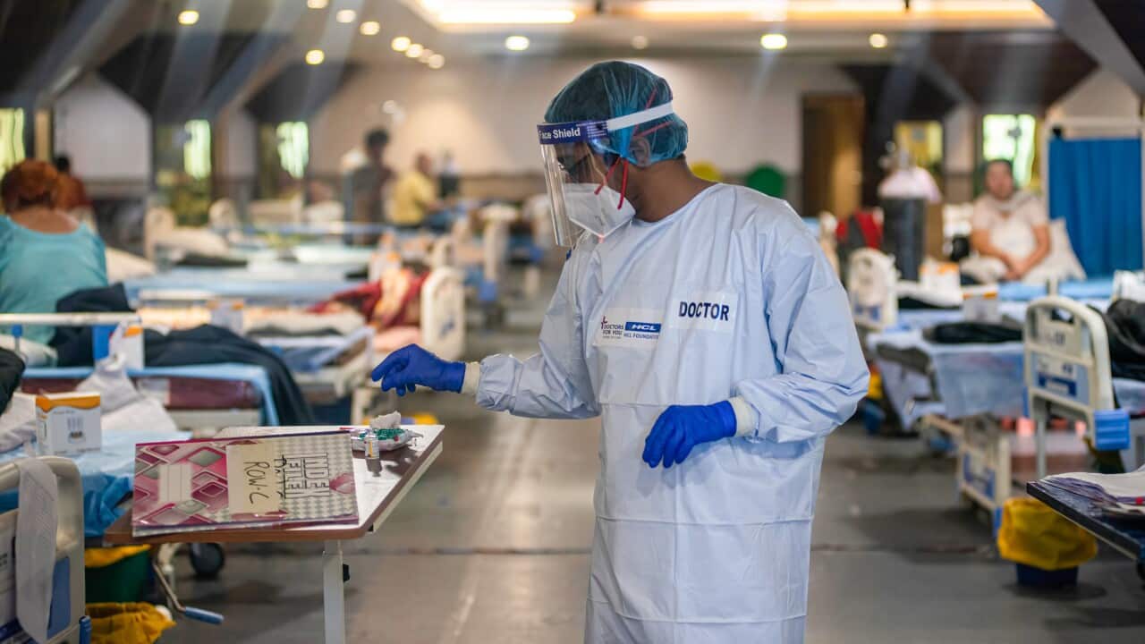 A doctor wearing PPE working at the Covid-19 Care Centre which is attached to Lok Nayak covid-19 Hospital.