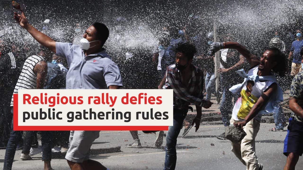 Nepal police use water cannon to stop religious rally amid COVID-19 surge