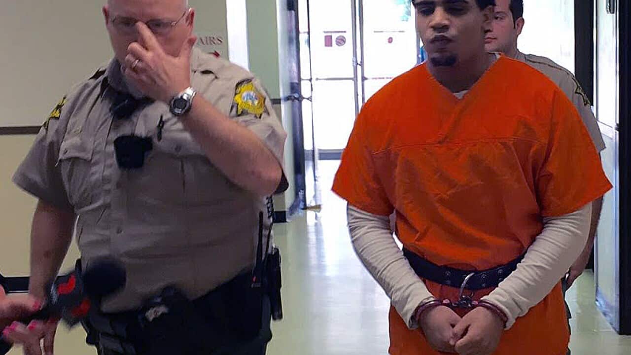 Convicted murderer Chancey Luna (right) is led into Stephens County court to be sentenced in Duncan, Oklahoma, Tuesday, June 16, 2015.