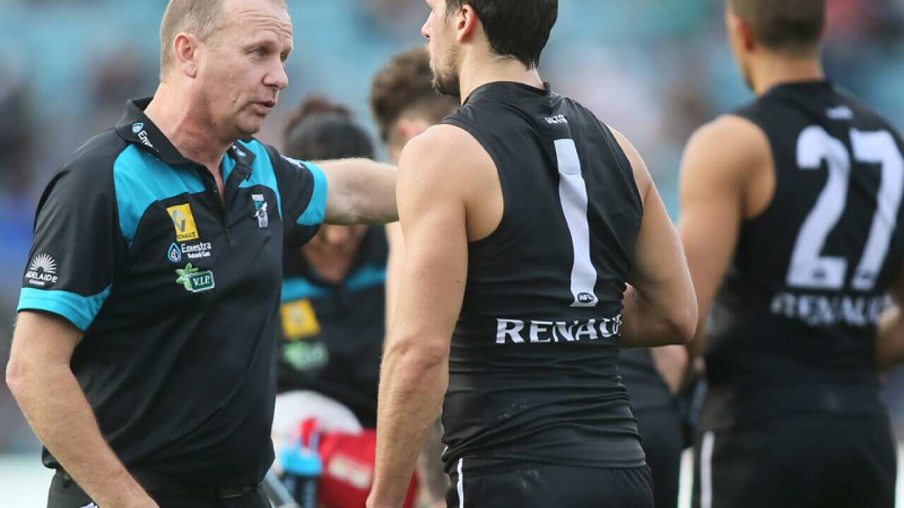 Port Adelaide coach Ken Hinkley (L)