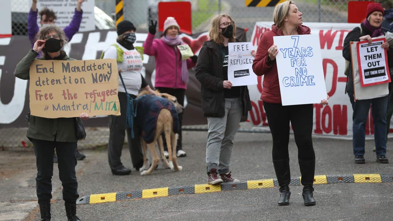 Protesters participate in a "Free The Refugees" rally at the Melbourne Immigration Transit Accommodation Centre in Melbourne.
