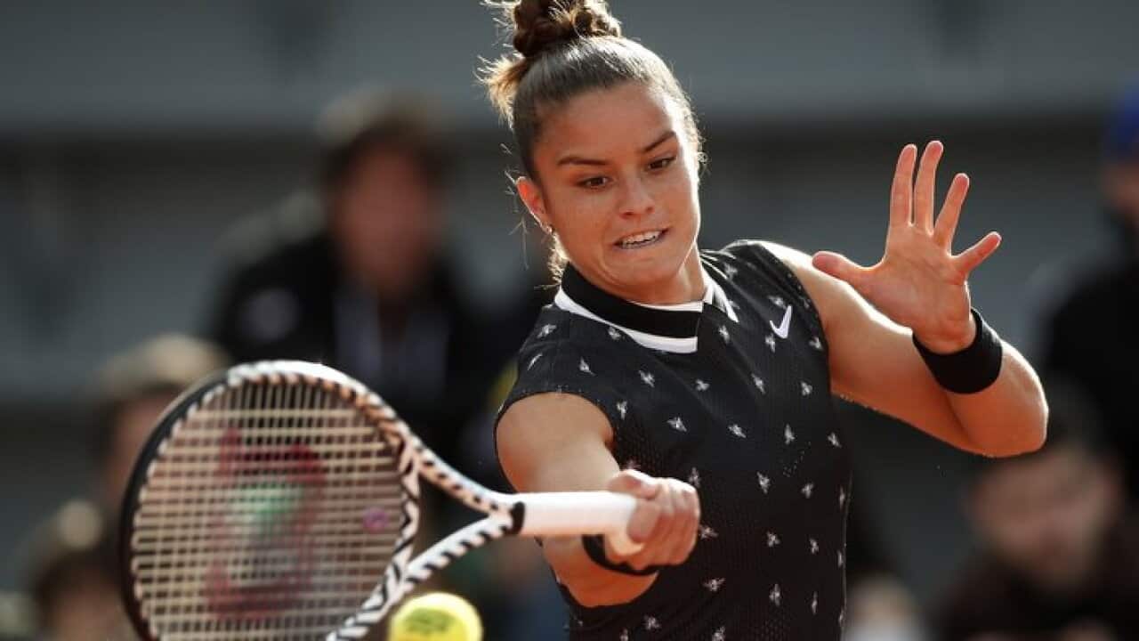 Maria Sakkari plays Anna Tatishvili during their women’s first round match during the French Open tennis tournament at Roland Garros in Paris.