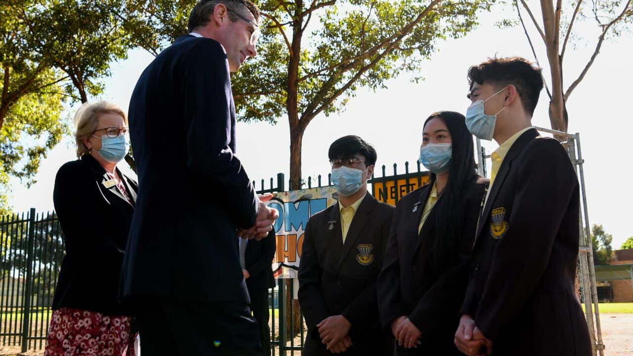 NSW Premier Dominic Perrottet meets with Year 12 students from Fairvale High School before a press conference at Avery Park in Sydney, Monday, October 25, 2021.