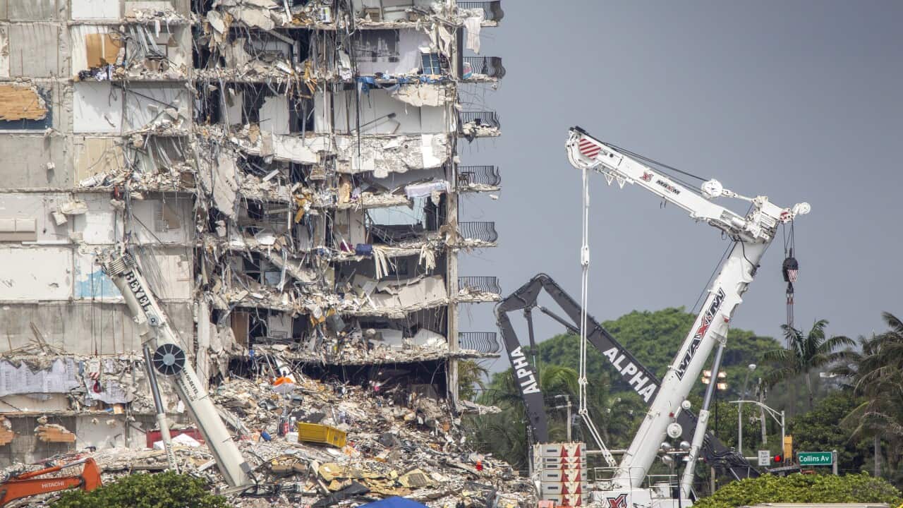 The east view of the partially collapsed Champlain Towers South condominium building