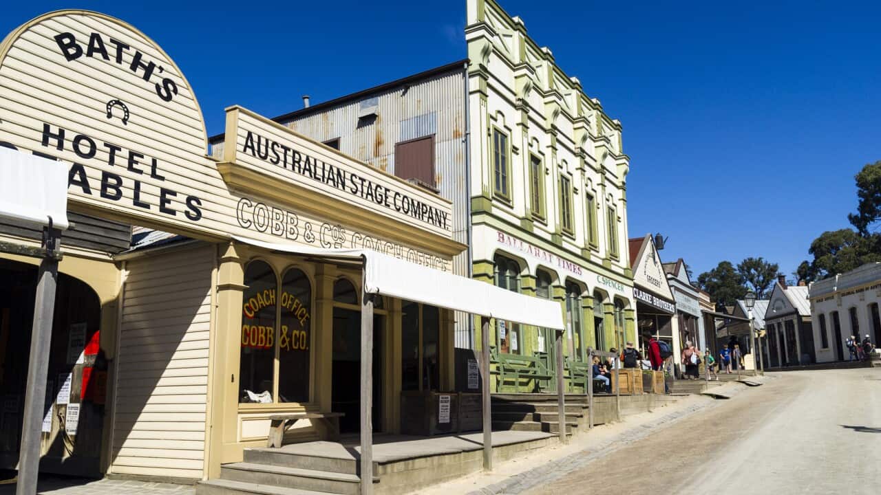 A hotel and stables in the Main Street of a gold mining town museum.
