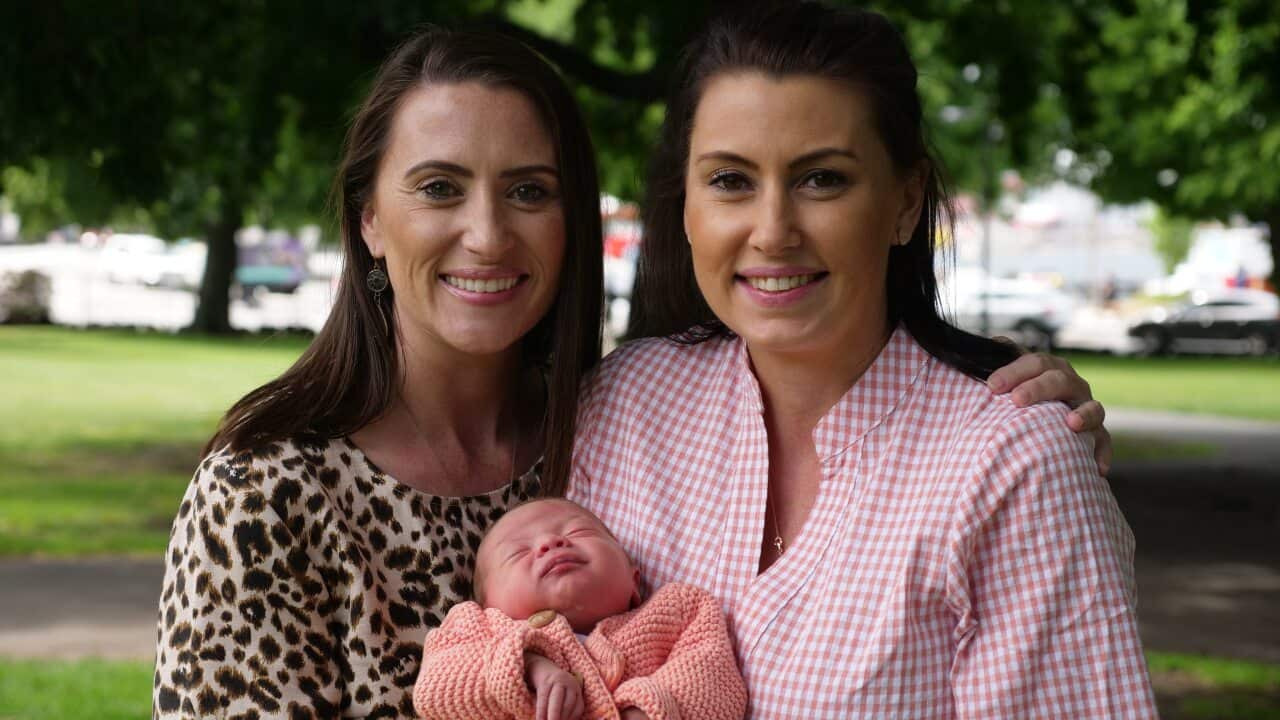 Natalie and Jacqui Gray, with baby Tilly. The sisters began the campaign Your Choice Tasmania, following their mum's battle with cancer.