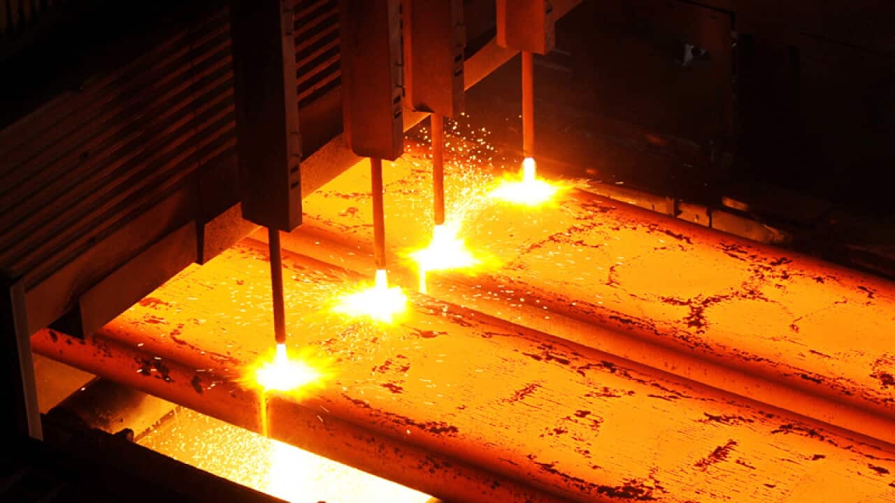Steel is cut into slabs at the BlueScope Steel plant