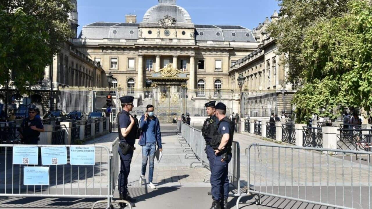 Security forces outside Palais de Justice courthouse in Paris as the trial begins over the Bataclan attacks.