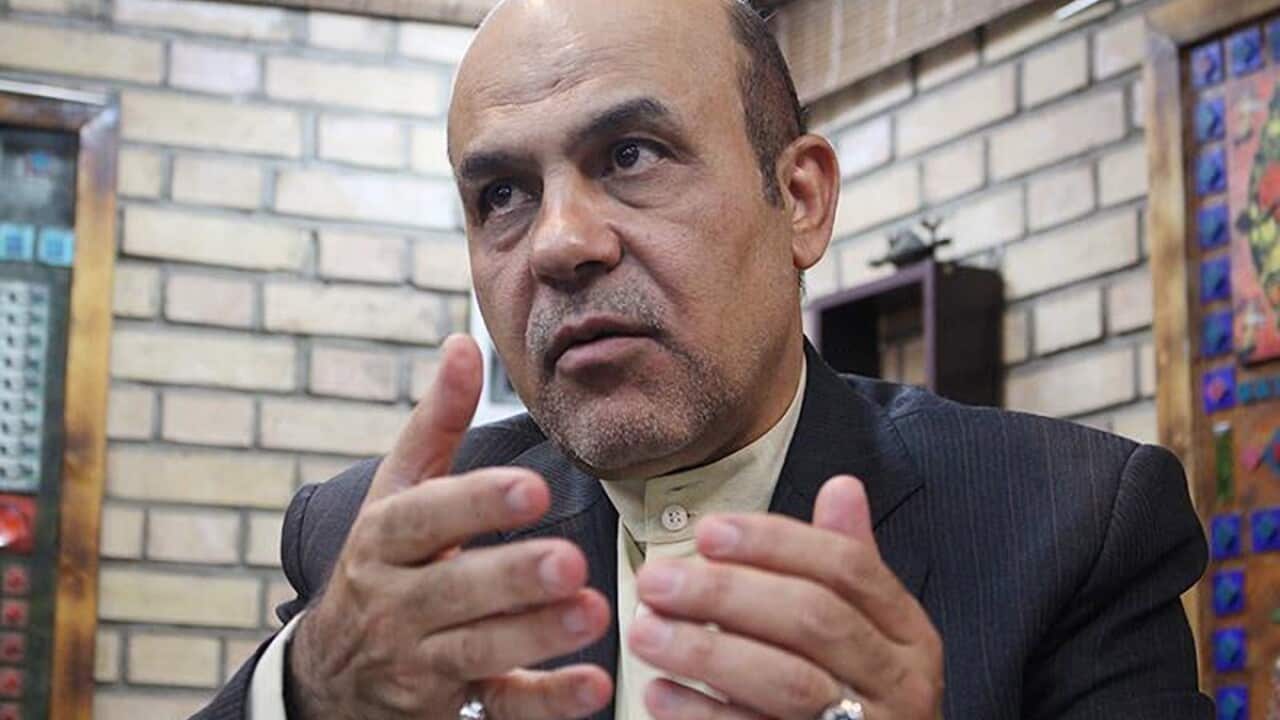 Former Iranian deputy of defence ministry Alireza Akbari in Tehran gestures while being interviewed.