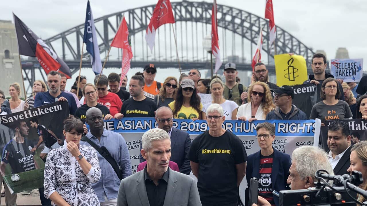 Former Socceroos captain Craig Foster speaks at the Sydney protest.