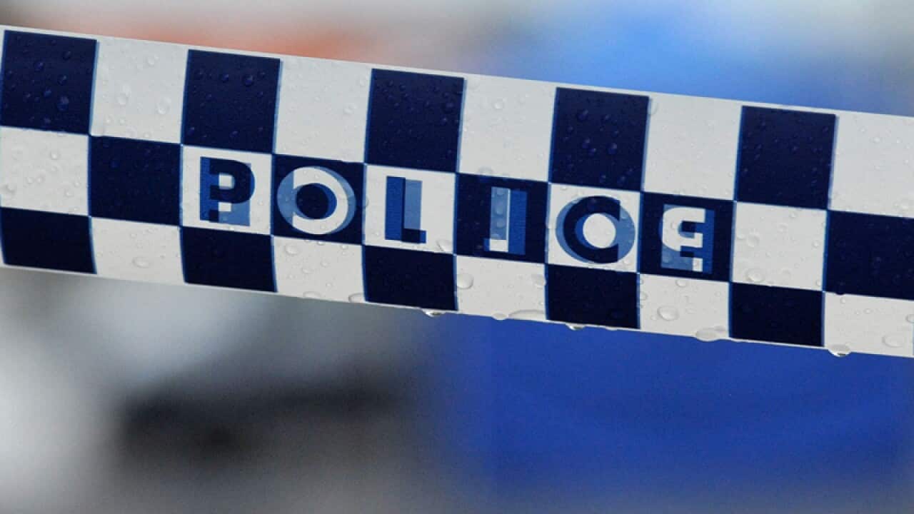 Police tape restricts access to a crime scene north of Sydney