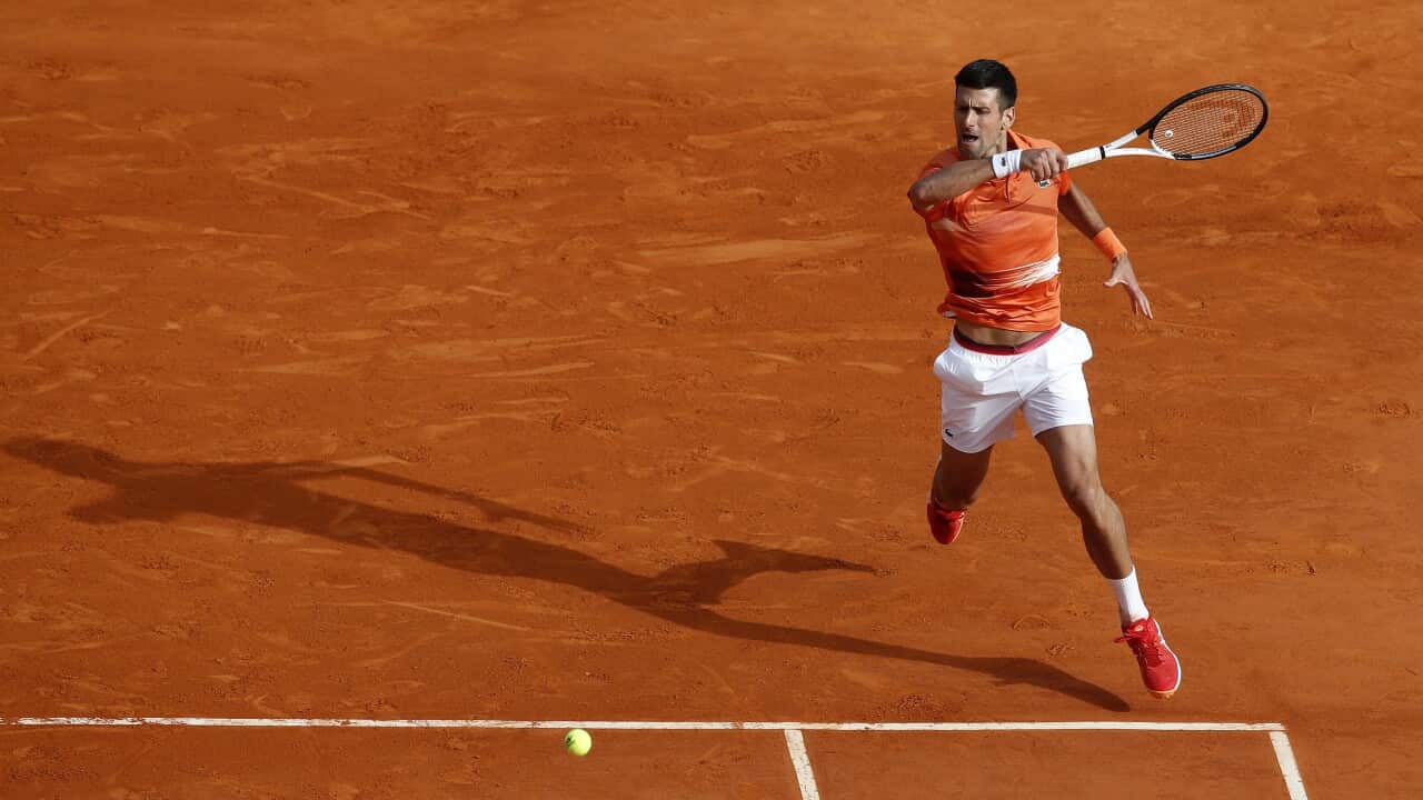 Novak Djokovic of Serbia returns the ball to Alejandro Davidovich Fokina of Spain during their match at the 2022 Monte-Carlo Masters tennis tournament