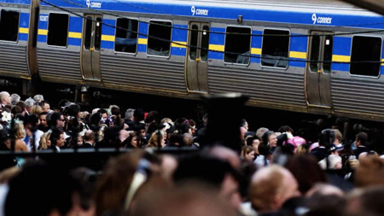 Train_commuters_Melbourne_aap_270710_L_2008578055