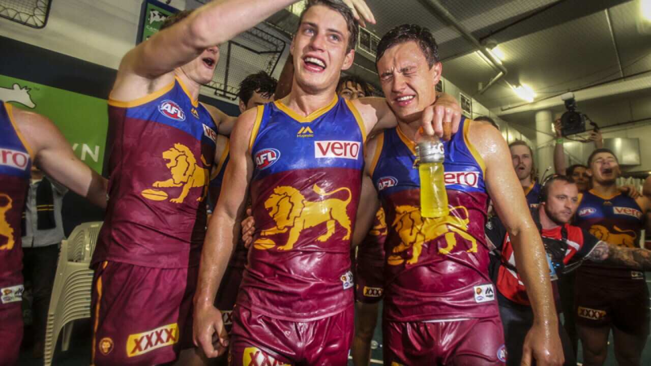 Lions players celebrate