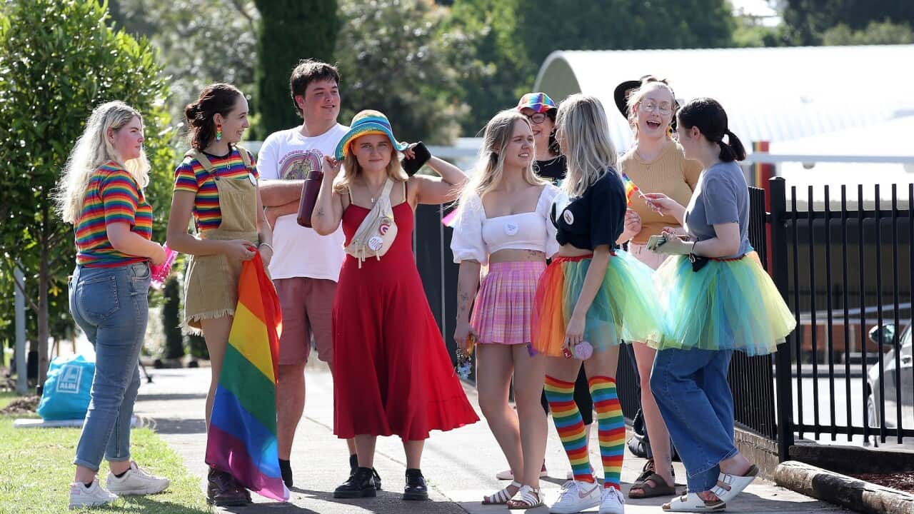 Members of the LGBTQI+ community protest outside a Christian school in Brisbane in 2022