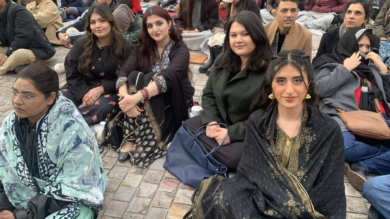 picture of people sitting on Fed square in Melbourne