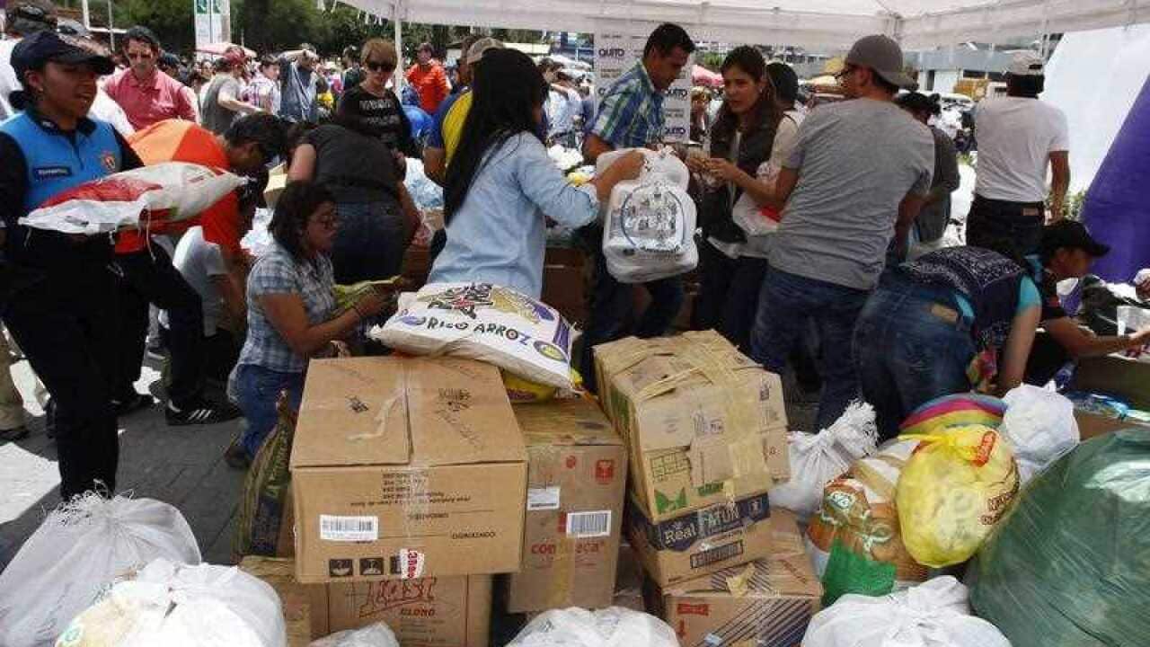 Citizens of Quito receive humanitarian aid after a 7.8 magnitude earthquake in Quito, Ecuador
