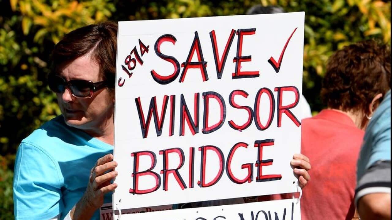 Protesters are seen outside Hawkesbury Regional Gallery in Windsor,