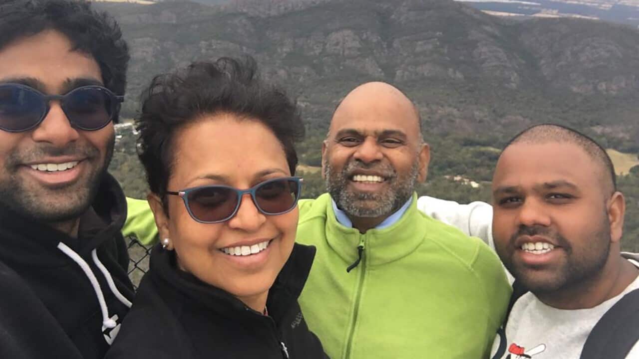Ramana Akula (second from right), who has lived in Australia for 30 years and has citizenship, is currently among the thousands stranded in India.