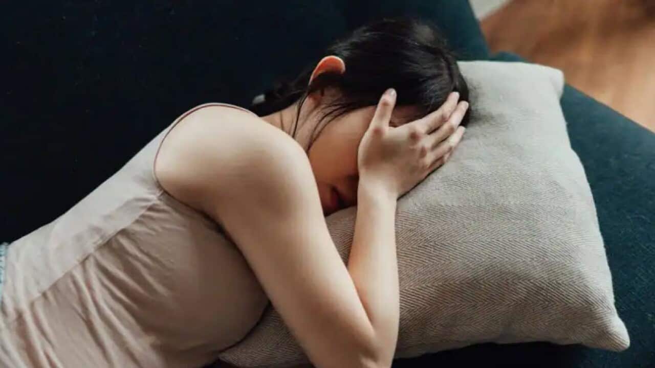 Young Asian pregnant woman suffering from emotional stress and anxiety