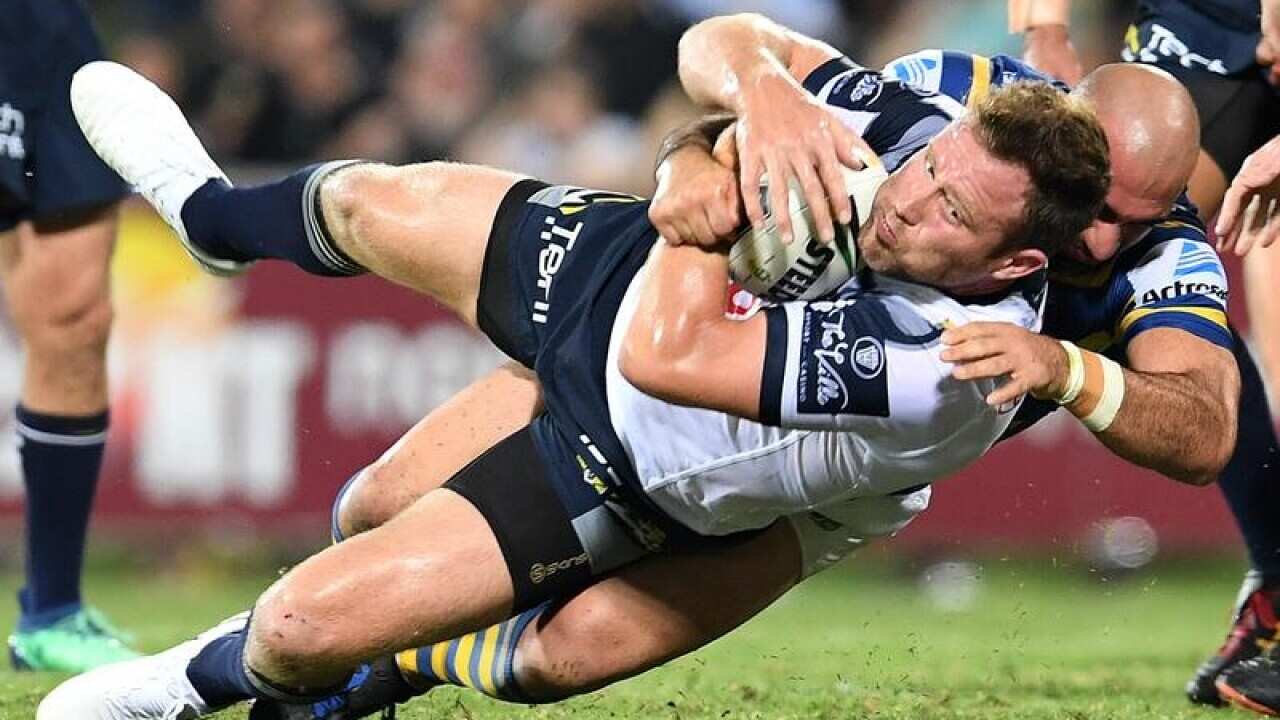 Gavin Cooper of the Cowboys in action